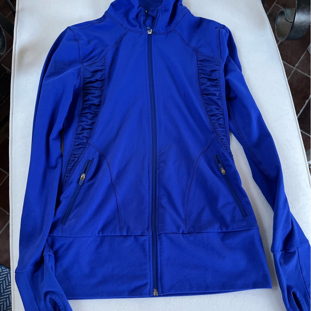 Zip up workout jacket. RBX brand.  Ruched at center. Semi fitted style xs